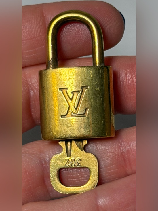 Louis Vuitton Accessories - Louis Vuitton 302 lock and key